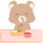 お弁当を食べる子クマ